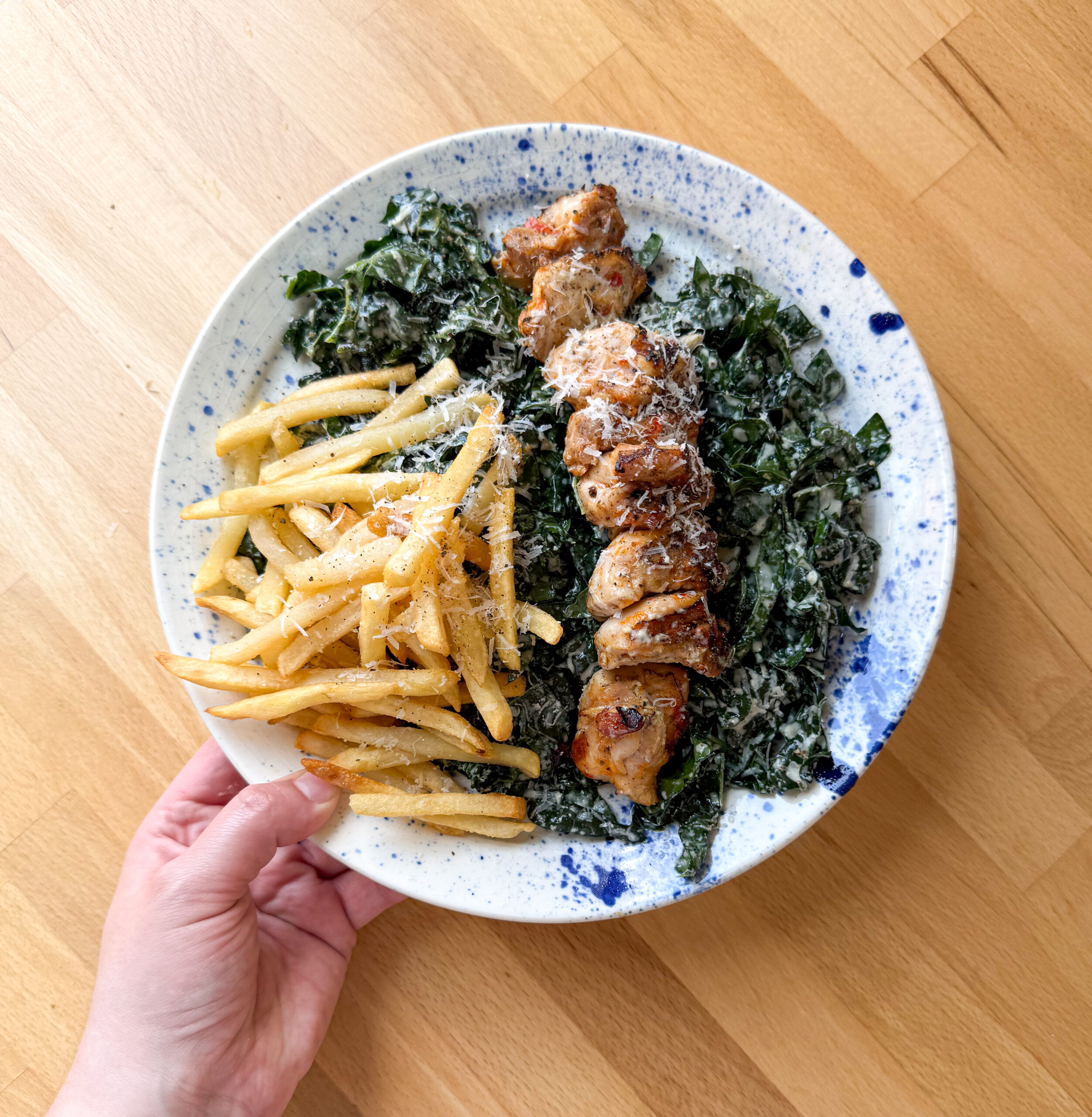 Kale Caesar Salad with Grilled Chicken and Fries