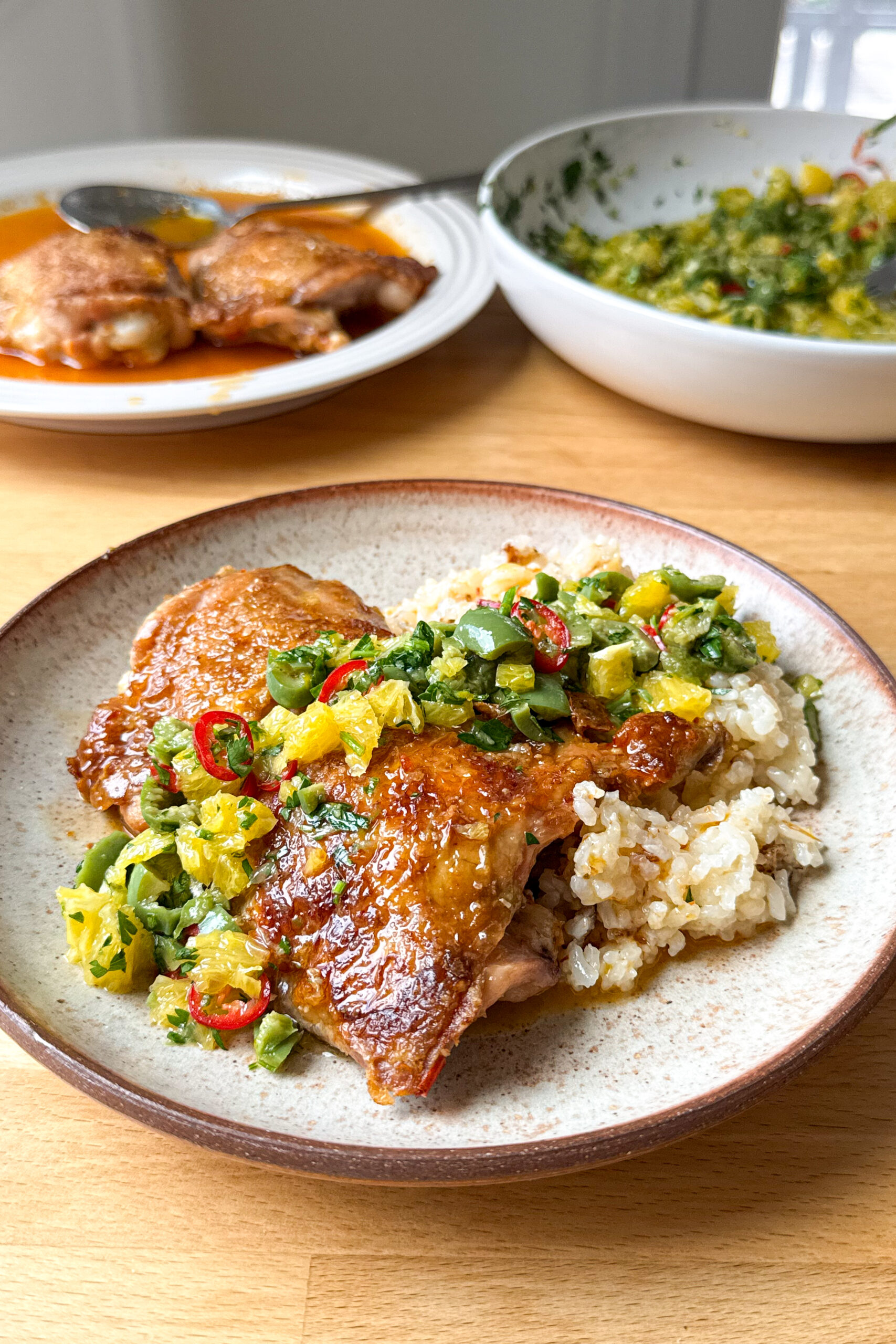 Orange-harissa chicken with citrus and olive salsa