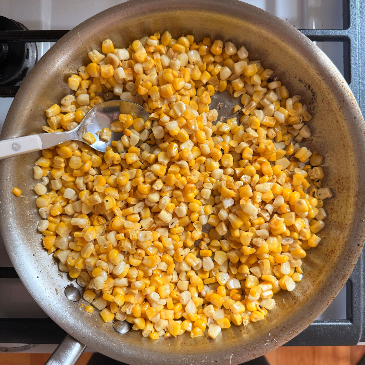 corn kernels cook lightly in butter