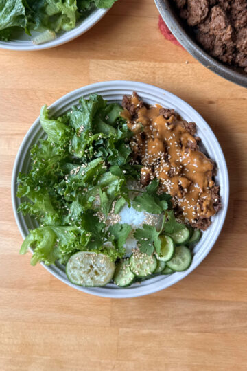 lean ground beef cooked in peanut-soy sauce served with lettuce, cucumber, cilantro and lime